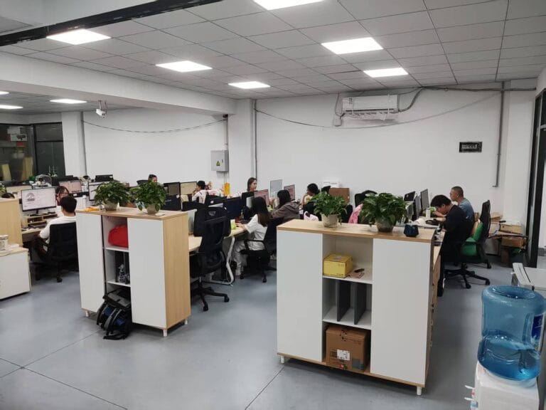 Open-plan sales and service office with the Furvorite team working at computers to support global B2B pet brands.