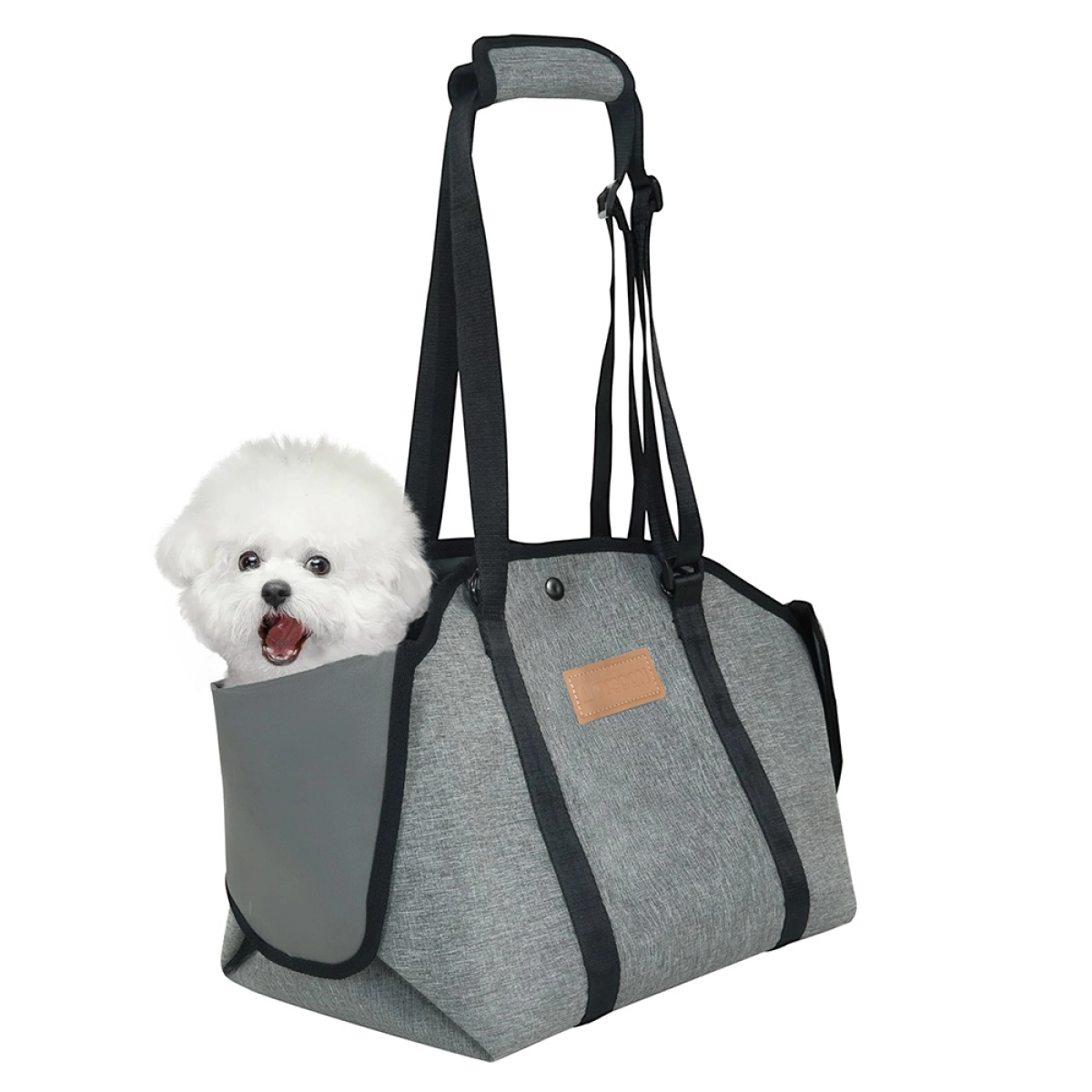 Small dog sitting in a StridePaw gray pet tote carrier with reinforced sides and long shoulder straps